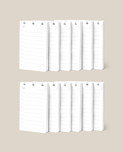 Two rows of white Discbound Analog Refill (12-pack) notepads with checklist designs and checkboxes are neatly arranged against a beige background—ideal for use with Analog Cards or as refills for your Discbound Analog system.