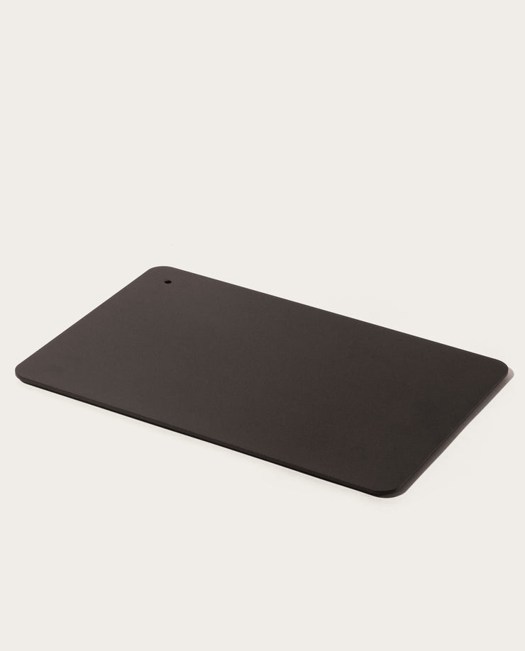 The Gather 2x3 Base Plate (Black), a rectangular powder-coated steel board with rounded corners and a small hole in one corner, is displayed on a plain white background.