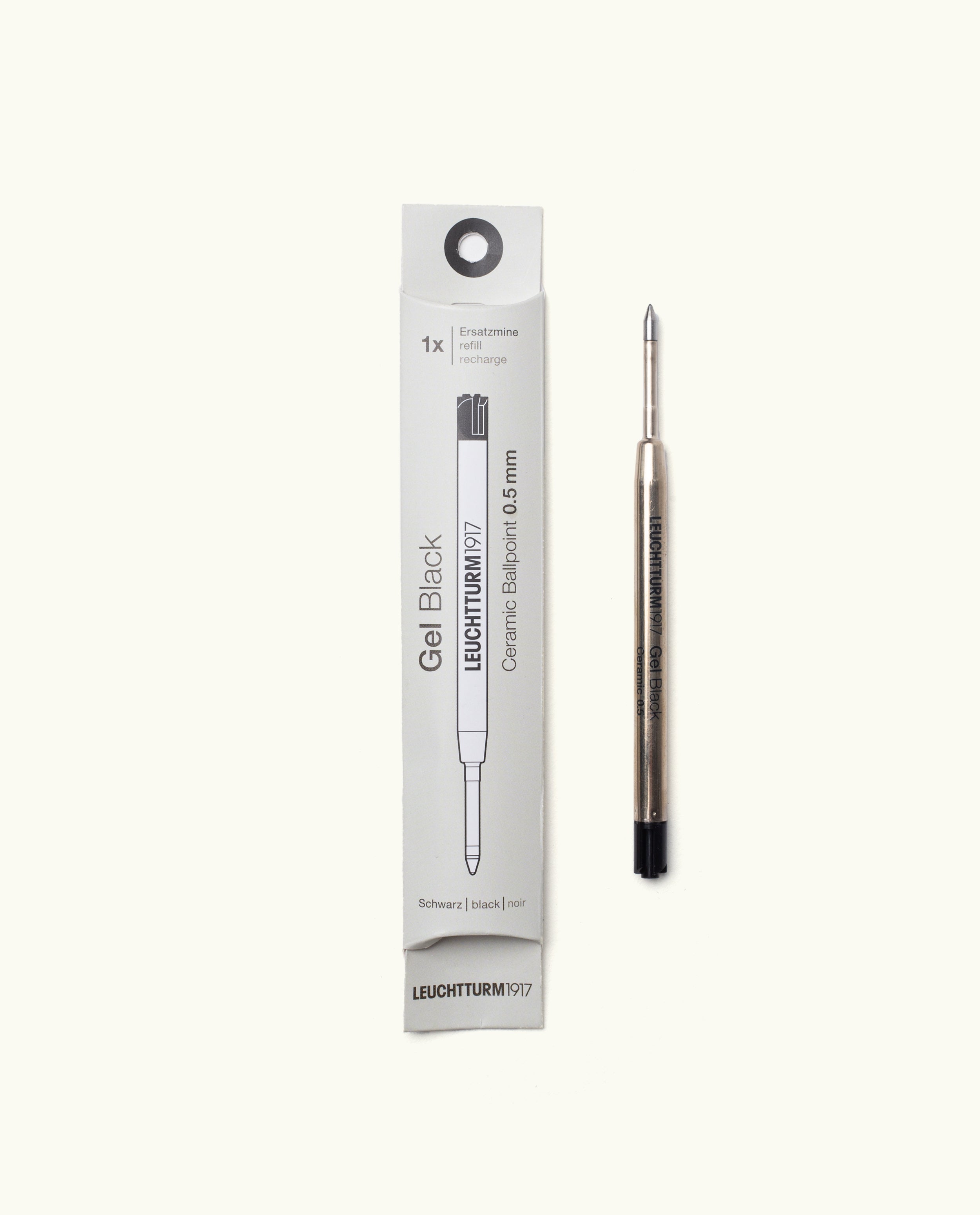 A Black Gel Pen Refill (The Ugmonk Pen) is shown beside its white rectangular box, which features black text and a line illustration of the black gel refill.