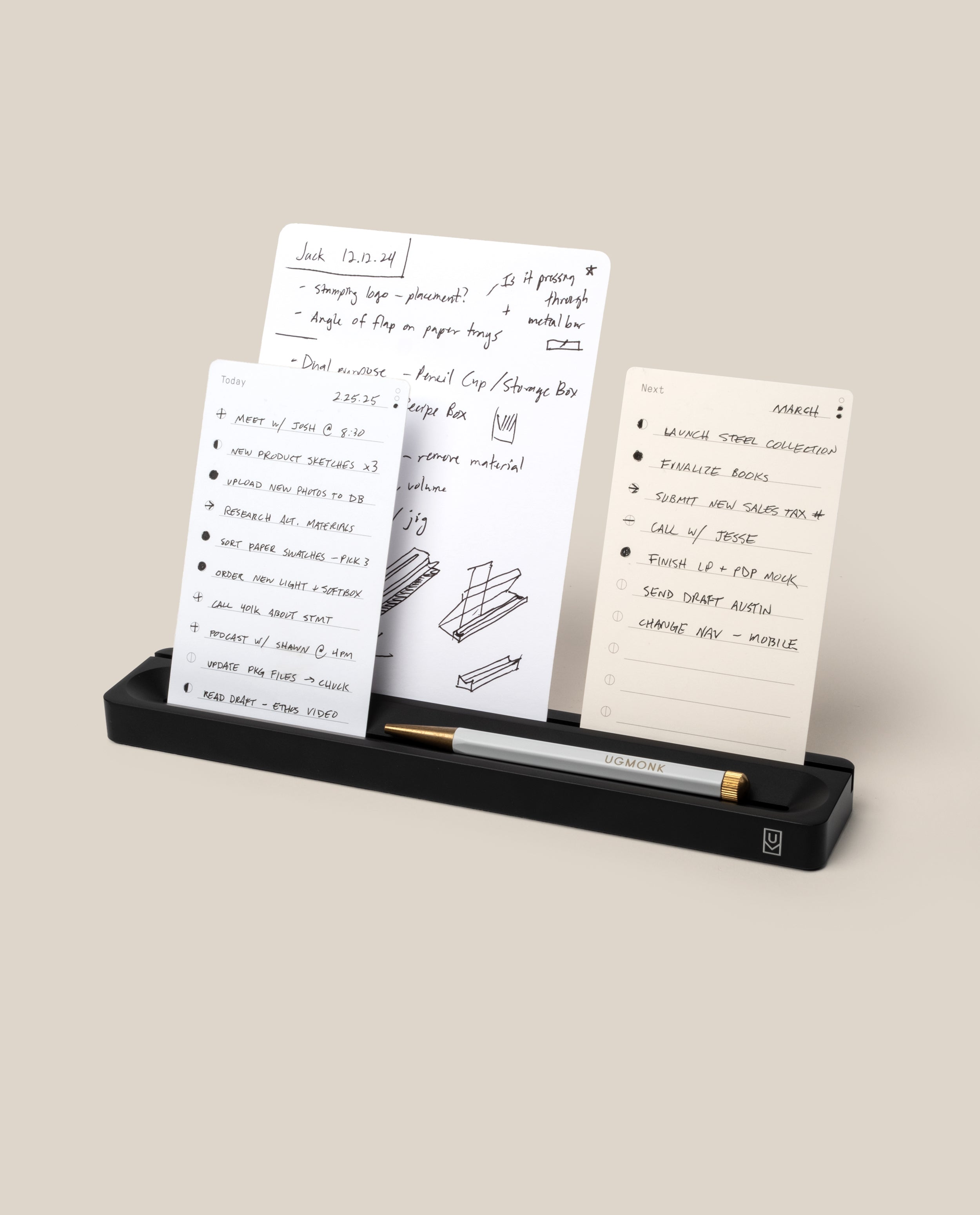 The Analog Card Bar (Small 10" - Black) organizes a gold and black pen with three notecards showing handwritten notes, to-do lists, and diagrams on a neutral beige background.