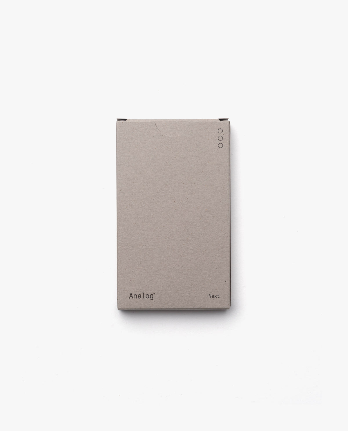 A minimalist light brown box labeled Analog - Next Cards (1-Pack) sits on a white background. Three dots in the top right suggest dot grid cards inside, perfect for goal-setting and organizing your thoughts.