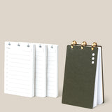 The Discbound Analog + 3 Refills, featuring a dark green cover, stands upright by three stacks of refillable task planner pages with brass disc binding, checkboxes, and lined note sections on a light beige background.