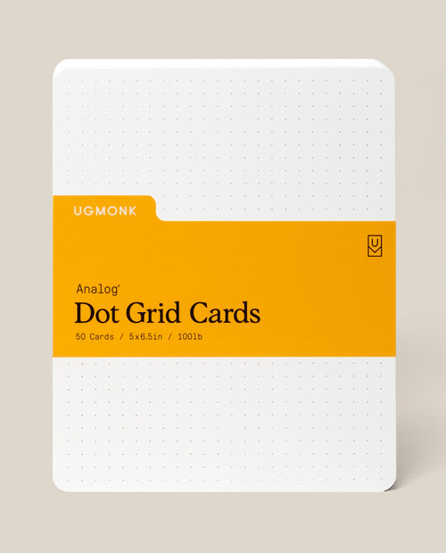 A pack of Analog Dot Grid Cards - Large with a yellow label, featuring 50 white uncoated 5x6.5" cardstock cards with a faint dot grid and rounded corners—ideal for sketching—shown on a neutral background.