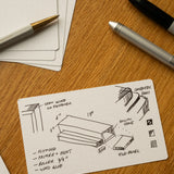 The Analog Dot Grid Cards - Small (3-Pack) are perfect for note taking and sketches. Each 3x5 card features a dot grid, ideal for diagrams or details, and fits easily alongside your favorite pens on any desk or workspace.