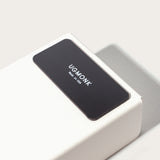 The Gather 2x2 Organizer Set (White) is a minimalist powder-coated steel box with a black label reading "UGMONK Made in USA." This customizable desk organizer casts a subtle shadow on a light surface.