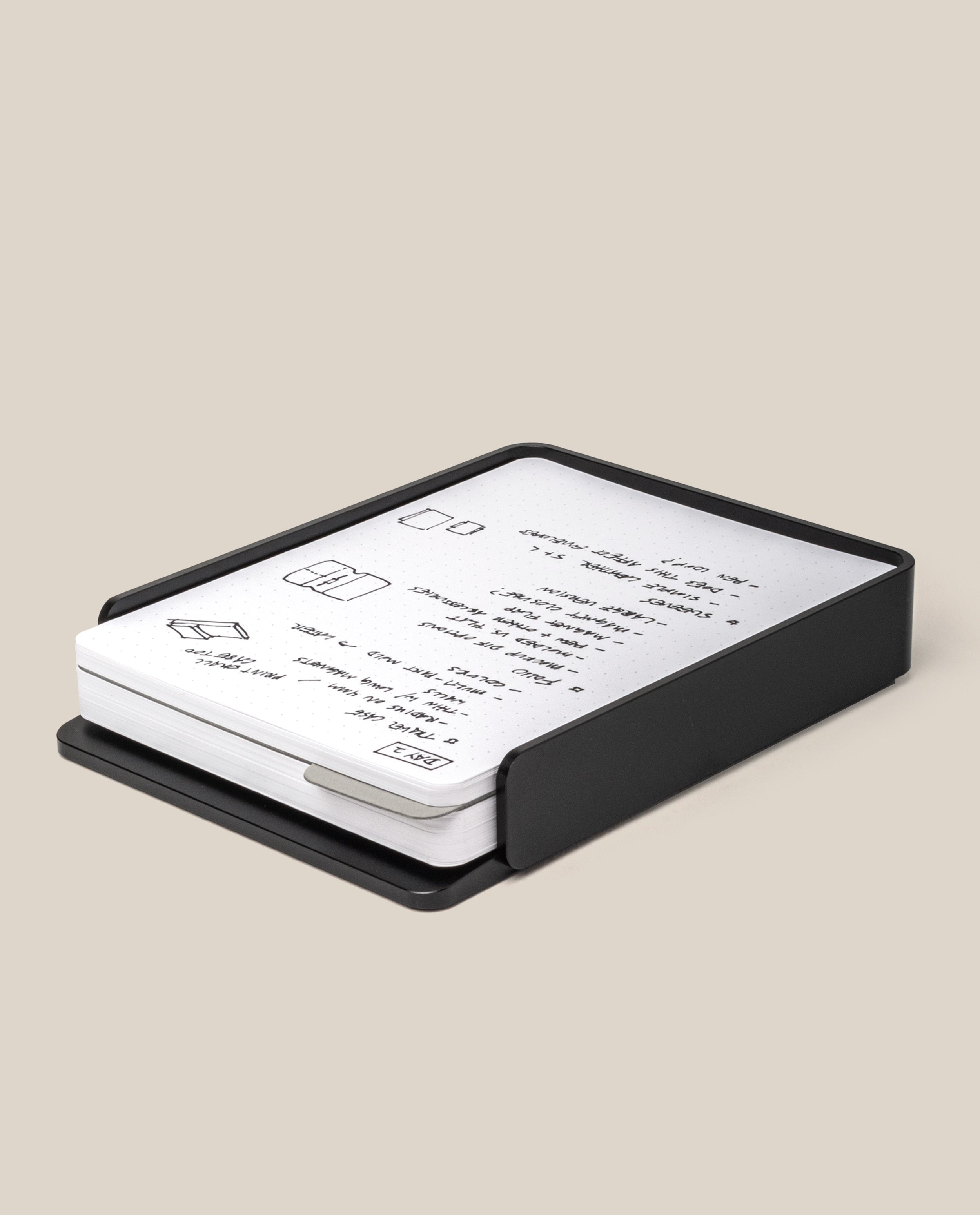 The Analog Capture Kit - Large (Black Aluminum) features large dot grid cards with black text and simple illustrations, neatly arranged in a minimalist solid black aluminum tray—perfect for capturing ideas.