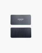 Two rectangular black leather labels are shown on a plain white background. The top label, intended for the Warehouse Item - Magnet Kit (For Analog Card Holder), features "UGMONK Made in USA" printed in white; the bottom label is blank.