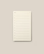 Analog - Next Cards: Notepads featuring the word “Next” at the top and eight numbered lines for writing tasks or notes, set against a plain beige background—perfect for goal setting or capturing ideas on Analog - Next Cards.