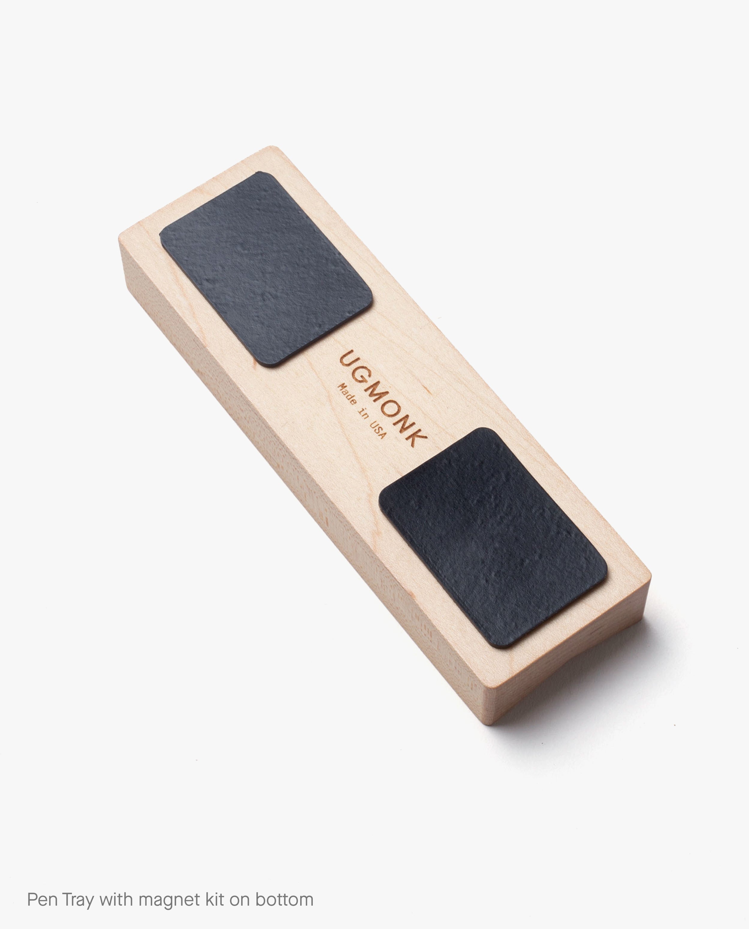 A Warehouse Item - Magnet Kit (Pen Tray and Analog Weekly), featuring a wooden pen tray designed to complement the Gather Monitor Stand, with two black rectangular magnets attached to the bottom, shown on a white background.