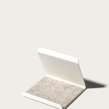 The Gather 2x2 Organizer Set (White) features a minimalistic L-shaped design in powder-coated steel with a textured light gray felt base, shown against a plain, light background.