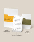 The Analog Starter Kit (Silver) includes three essential stationery items for your paper card system: a pack of large Dot Grid Cards, a pack of small Task Cards, and an aluminum Card Stand displaying a handwritten Task Card—each clearly labeled with product names and quantities.