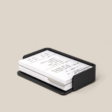 The Complete Analog Collection (Black Aluminum): a black metal organizer holding white index cards with handwritten notes, displayed on a neutral beige background.