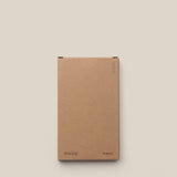 A plain brown box labeled "Analog" (bottom left) and "Someday" (bottom right), shown on a light beige background, features three small circles top right—ideal for storing your Analog - Someday Cards (1-Pack).