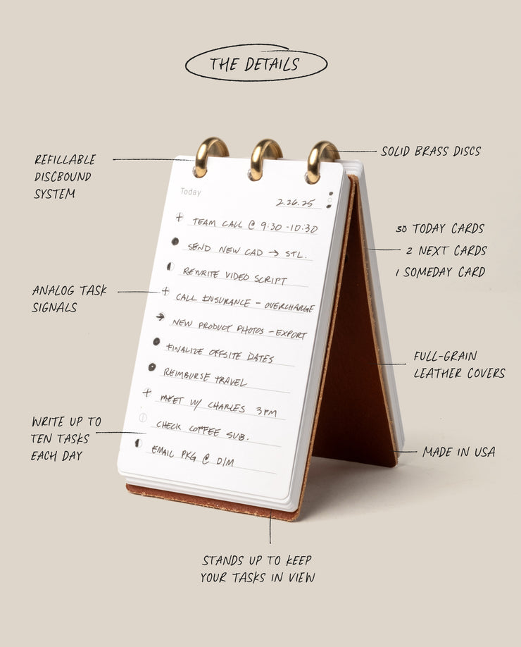 Desk calendar with stand and task list, labeled features on a beige background