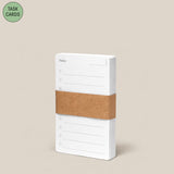 The Analog - Task Cards (1-Pack) features a stack of white cards labeled "Today" with checkboxes, bound by a brown paper band on a beige background. A green circle at the top left says "TASK CARDS—perfect for task prioritization.