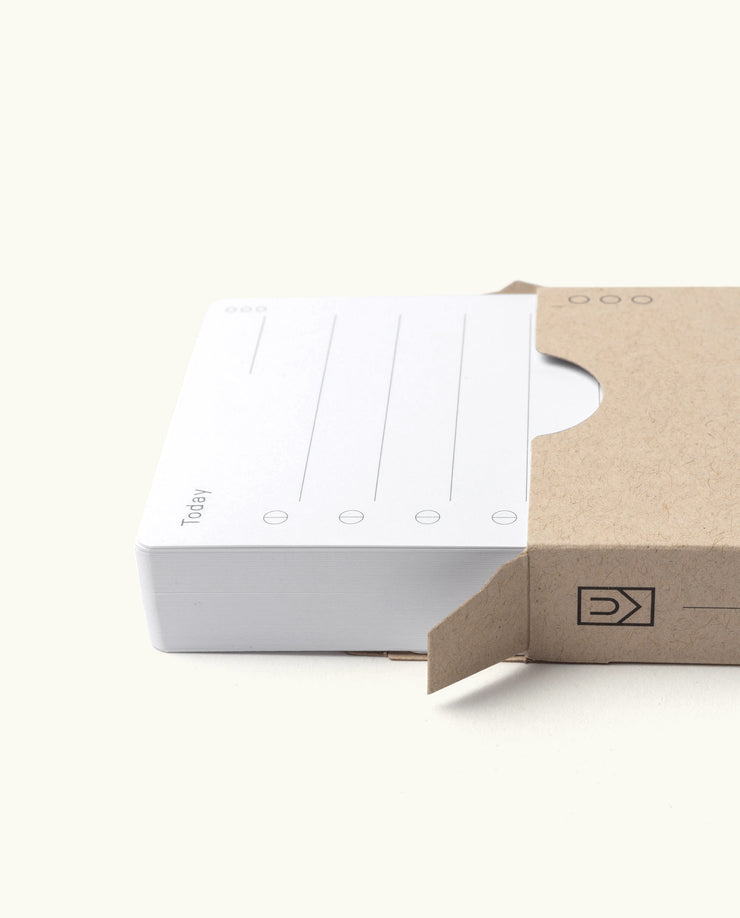 A 12-pack of Analog Today Cards with lines and circles, partially slid out from a brown sleeve, displayed on a light background.