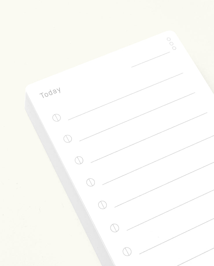 Analog Today Cards (12-Pack): Minimalist notepads inspired by analog note cards, each featuring "Today" at the top with a vertical list of blank lines and circles to organize daily tasks on a clean, light background.