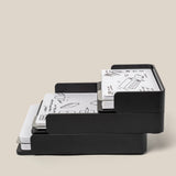 The Analog Capture Kit - 2 Large (Black Aluminum) features stackable black aluminum trays that hold notecard-sized papers in a stepped layout—ideal for organizing your dot grid cards efficiently.
