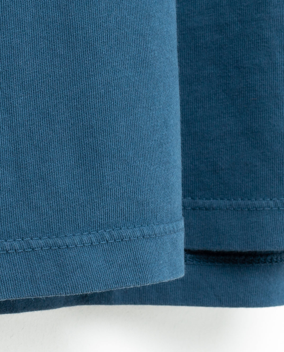 A close up of a blue fabric.