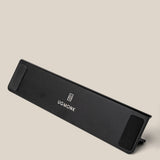 A black, rectangular wrist rest featuring the Ugmonk logo and name in white, displayed on a neutral beige background—perfect to pair with your Analog Annual Kit (Black Aluminum).