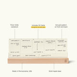 The Analog Weekly Planning Kit (Maple) includes 52 thick dot-grid planner cards and a solid maple holder. Made in Pennsylvania, it provides space for notes and daily tasks to keep your week organized.