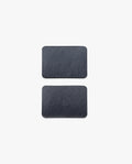 Two rectangular, black slate tiles with rounded corners—part of the Warehouse Item - Magnet Kit (Pen Tray and Analog Weekly)—are placed vertically on a plain white background, one above the other.
