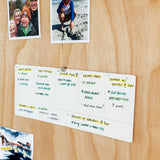 The Analog Weekly Planning Kit (Maple) features a maple board with photo slots, a postcard, color-coded notes, Weekly Planner Cards, and space to organize your meals, tasks, and appointments.