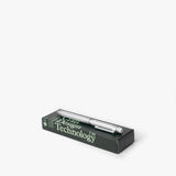 A silver Craft Design Technology Multifunctional Pen rests atop a dark green box labeled with the brand, set against a plain white background.