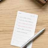 The Craft Design Technology Multifunctional Pen rests on a wooden desk next to a to-do list with tasks like editing web photos, publishing a new product, calling Laura at 2:00 pm, meeting Jason at 3:30 pm, and ordering packaging.