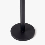 A close-up of the HMM Scissors (Black) shows its black, round magnetic metal base with a vertical pole at the center, set against a plain white background.