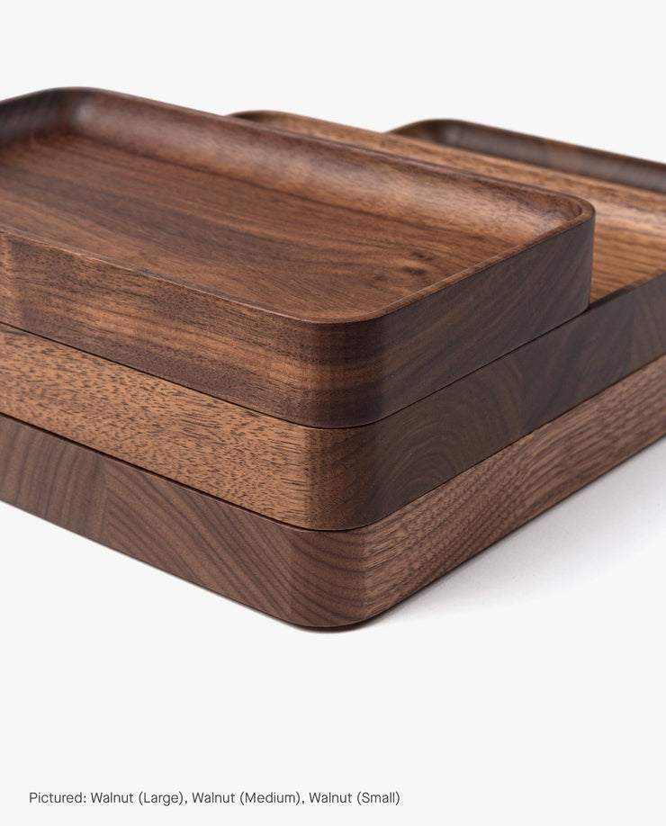 The Valet Tray (Walnut - Small) is handcrafted in Pennsylvania with smooth, rounded edges and a natural grain pattern—ideal for storing your everyday essentials.