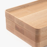 A close-up of the Valet Tray Bundle (Maple - Set of 3), each handcrafted in Pennsylvania with rounded corners, smooth edges, and natural light maple grain, stacked on a white background.