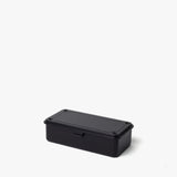 The Toyo Steel Stackable Storage Box T-190 (Black) is a small, rectangular steel toolbox with a fitted lid. Made in Japan, it features a sleek black finish and is shown on a plain white background.