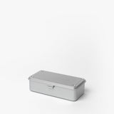 The Toyo Steel Stackable Storage Box T-190 (Silver) is a rectangular metal box with a hinged lid and latch, made in Japan. Shown here on a plain white background, it’s designed for easy stacking and durable storage.