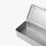 The Toyo Steel Stackable Storage Box T-190 (Silver), made in Japan, is a rectangular steel toolbox with a hinged lid partially open, revealing an empty interior. It is shown on a plain white background.
