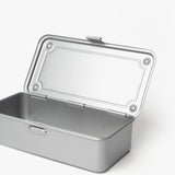 The Toyo Steel Stackable Storage Box T-190 (Silver) is a rectangular tin box with a hinged lid, revealing an empty interior. Made in Japan, this steel toolbox sits on a plain white background.