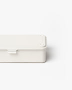 A Toyo Steel Stackable Storage Box T-190 in white, featuring a minimalist rectangular design with a lid, is shown from an angled perspective with part of the container cut off on the right side, set against a plain white background.